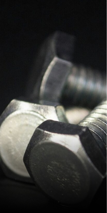 Close-up of steel bolts and fasteners used in industrial and mechanical applications